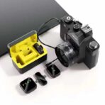 K50 Multi-Device Wireless Lavalier Microphone a phone and electronic devices a collage of a phone charging device a group of electronic devices on a tableK50 Multi-Device Wireless Lavalier Microphone a camera with a battery next to it